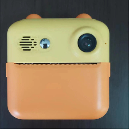 Set Camera Instantanee pentru Copii, Cyrax, Ecran HD 2.4'', 24MP, 720P Video, 1200 mAh, cu Functie de Printare Alb-Negru, cablu USB-C, Bluetooth, Compatibil iOS/Android, Imprimare APP, Portocaliu